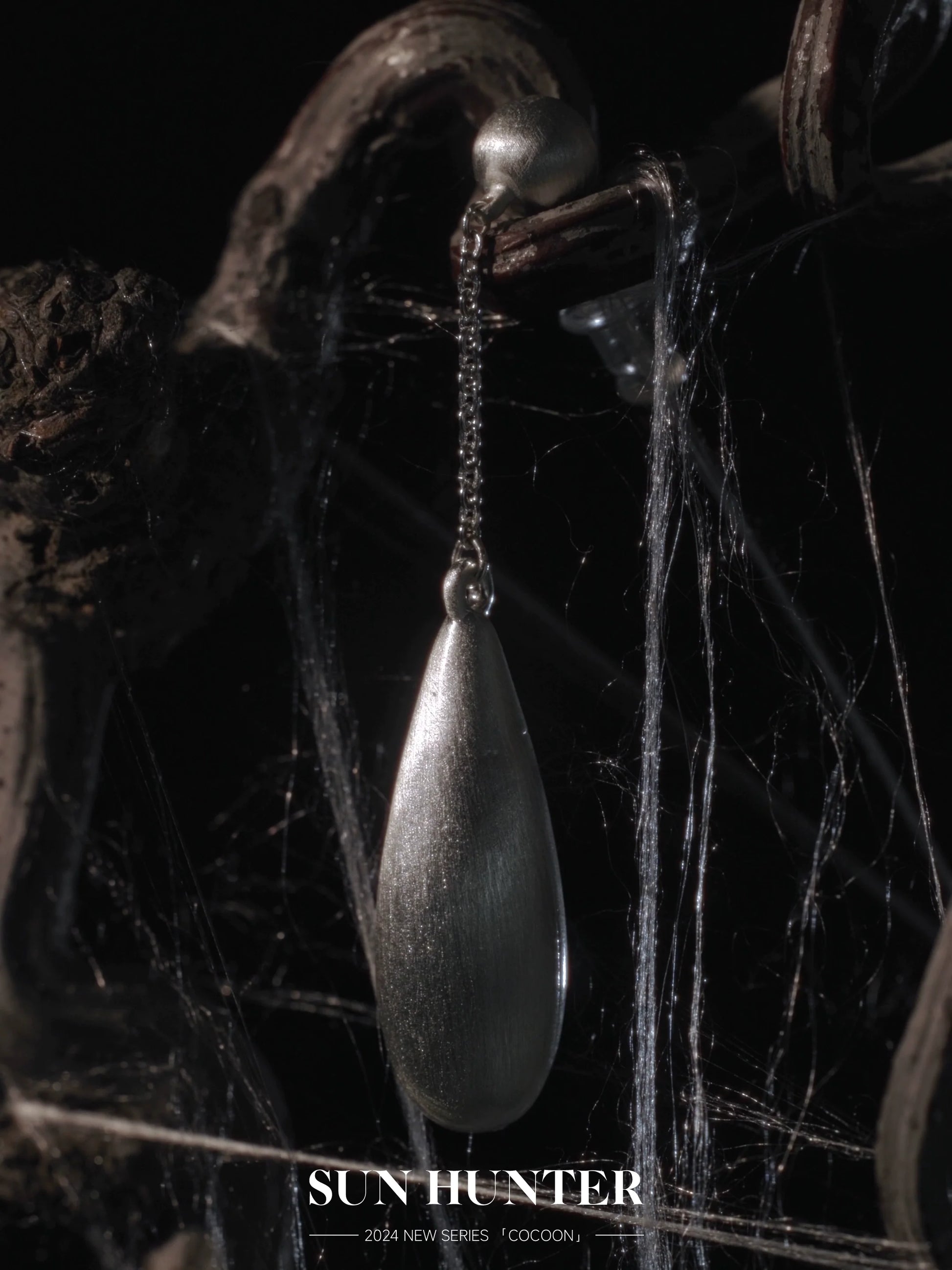 Elegant brushed teardrop earrings by SUN HUNTER with a sleek design for a modern look