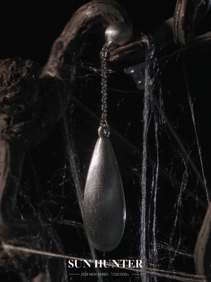 Elegant brushed teardrop earrings by SUN HUNTER with a sleek design for a modern look