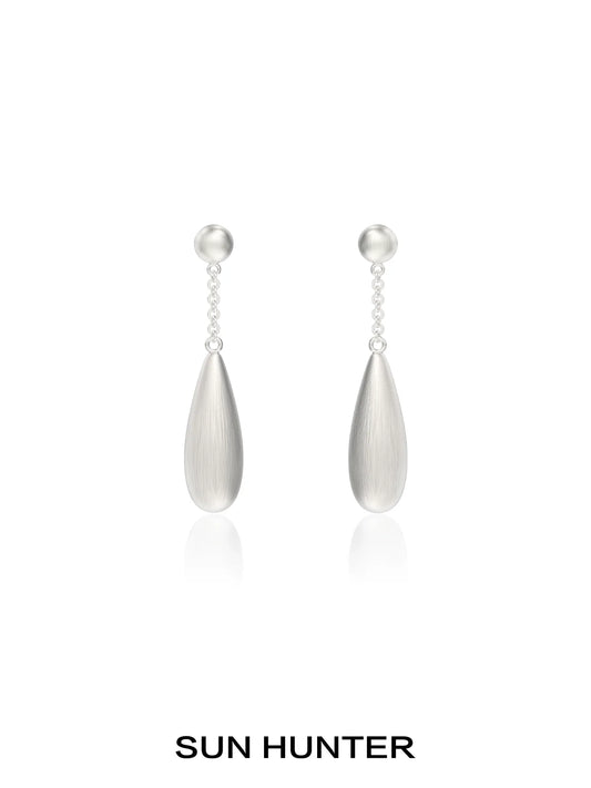 Elegant SUN HUNTER brushed teardrop earrings with silver finishes and classic design