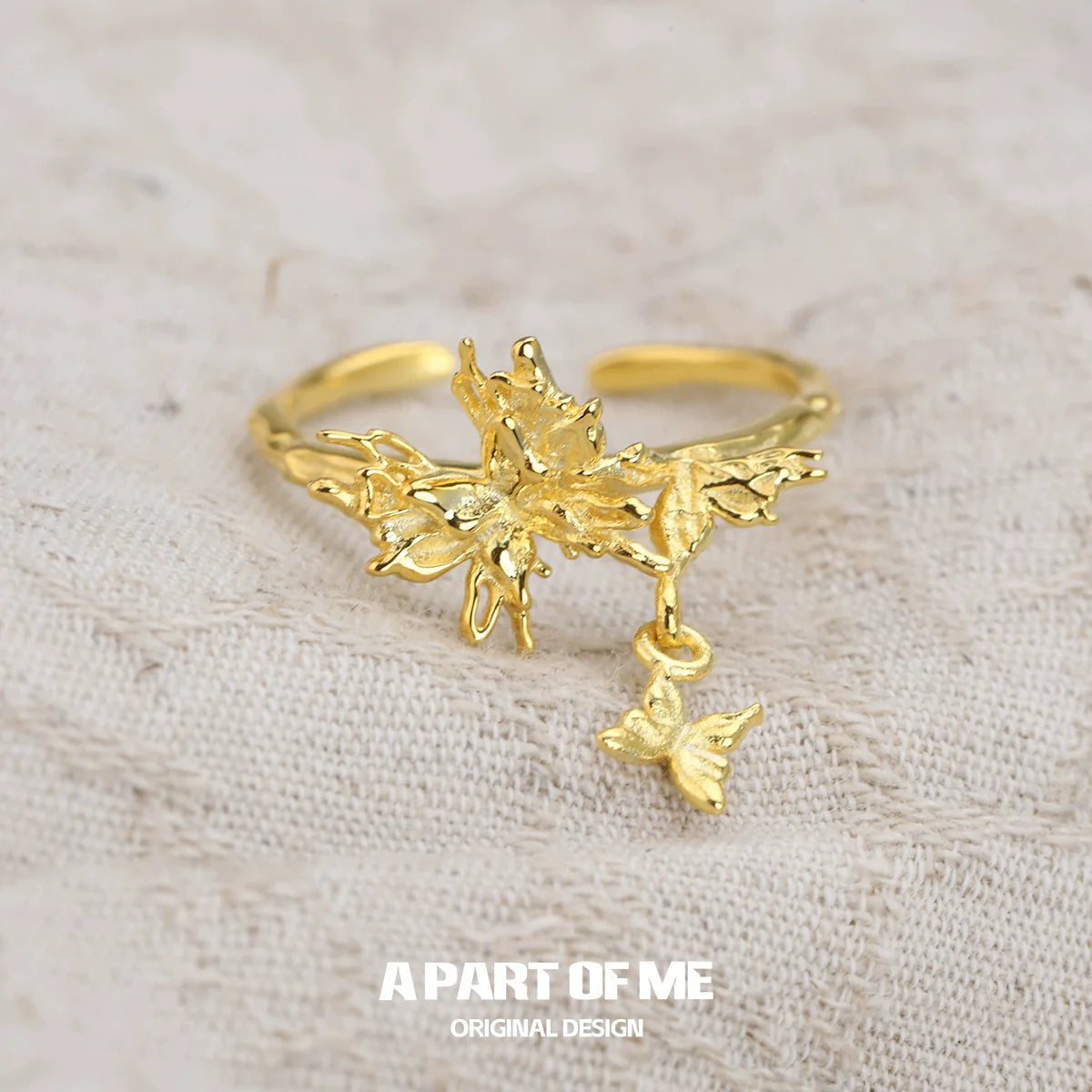 Elegant butterfly charm silver ring featuring intricate butterfly and leaf designs for a unique accessory