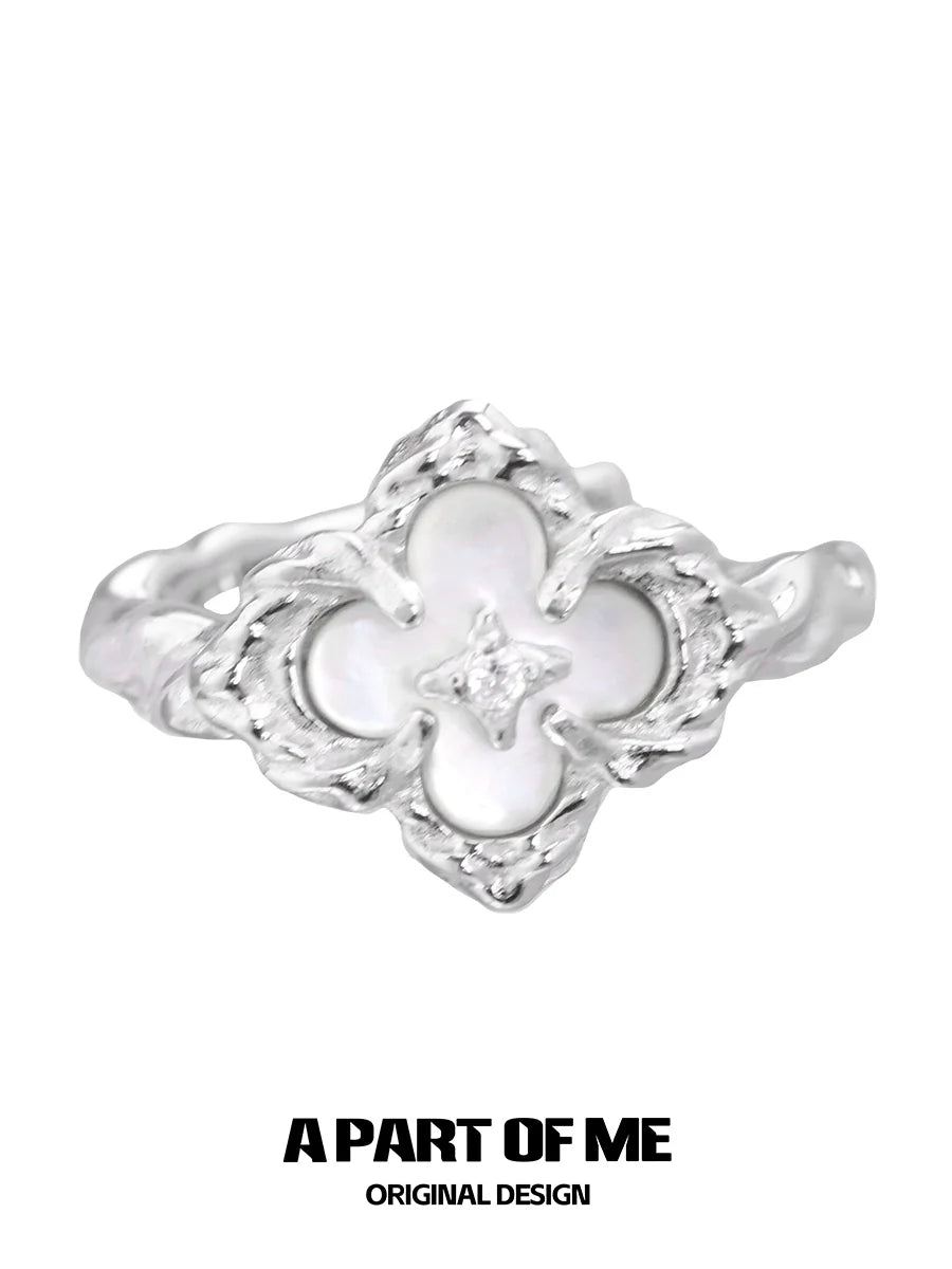 A PART OF ME butterfly clover silver ring with a detailed design and a central gemstone