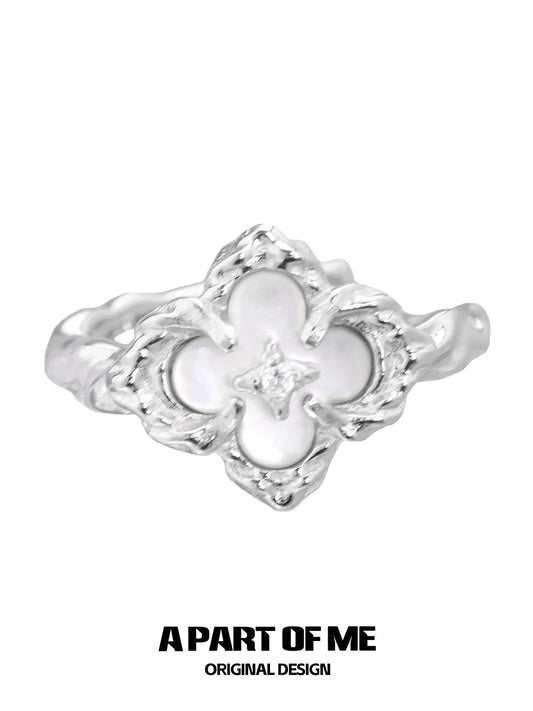 A PART OF ME butterfly clover silver ring with a detailed design and a central gemstone