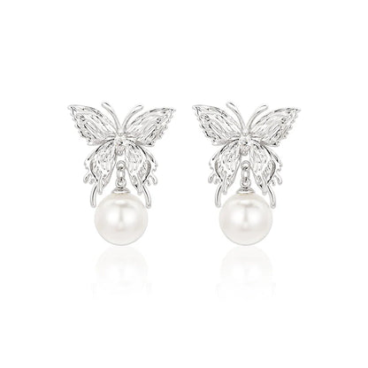 SUN HUNTER butterfly pearl earrings featuring elegant butterfly design with luminous pearls