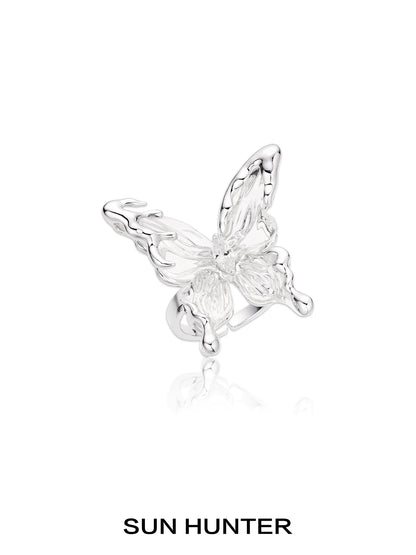 Elegant silver butterfly ring for women, featuring detailed wings and a sparkling center gemstone