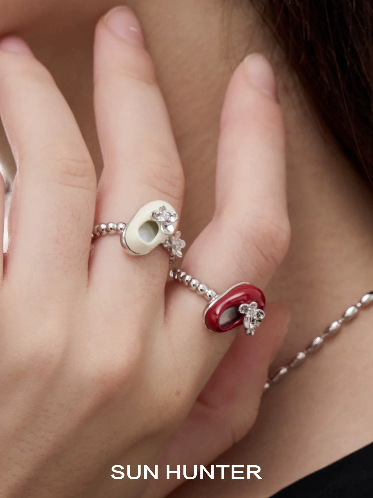 SUN HUNTER butterfly shoe rings featuring colorful designs with sparkling embellishments