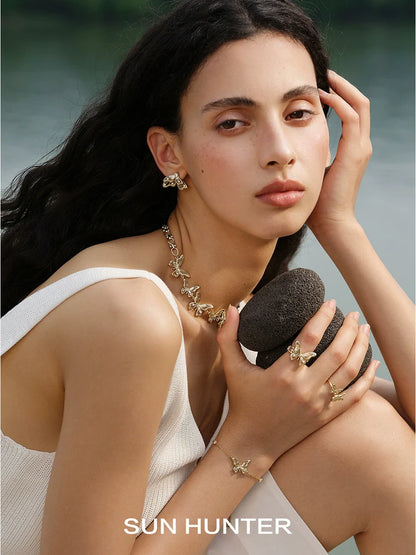 Elegant butterfly silver bracelet from SUN HUNTER, perfect for adding a touch of nature-inspired beauty.