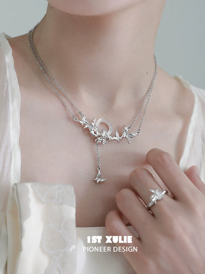 Delicate butterfly silver necklace from 1STXULIE with layered design and elegant charm