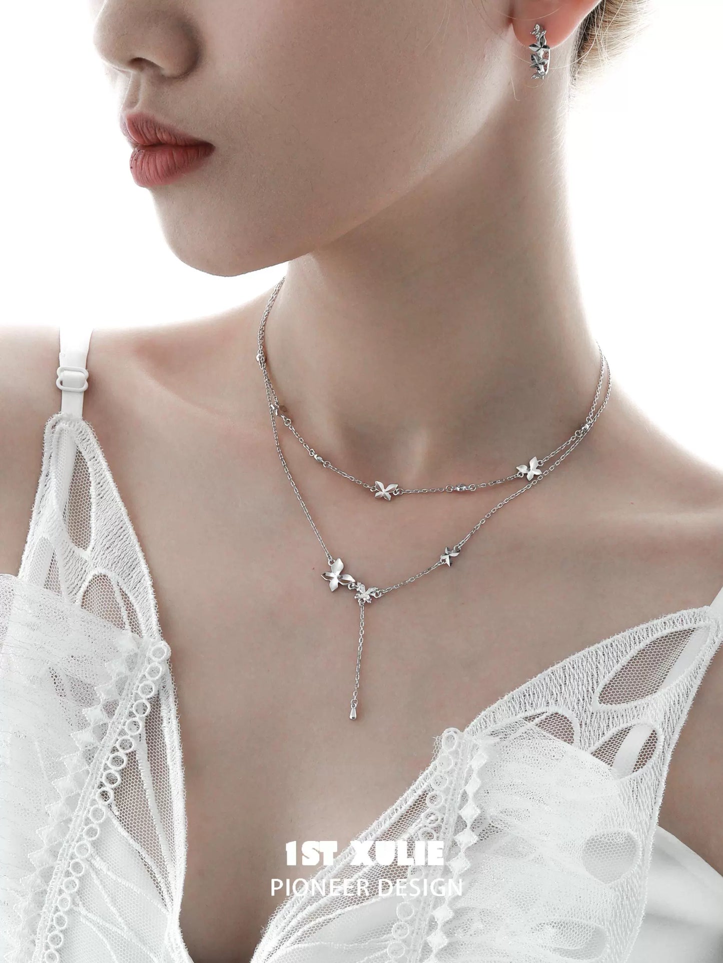 Elegant 1STXULIE butterfly silver necklace featuring a layered design with delicate butterflies