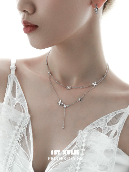 Elegant butterfly silver necklace featuring delicate butterfly charms for a trendy look