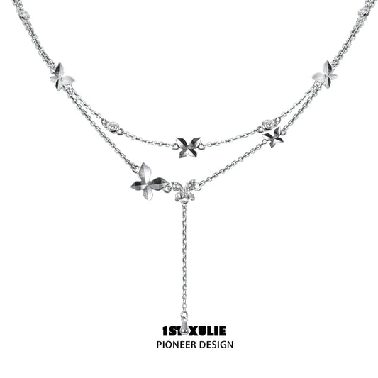 Elegant butterfly silver necklace featuring intricate floral designs and adjustable length
