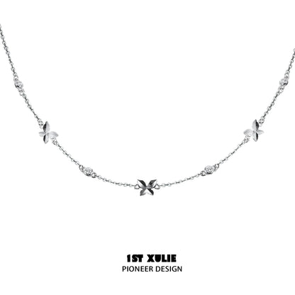 Elegant butterfly silver necklace featuring sparkling accents and a delicate chain design