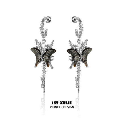 Elegant butterfly tassel shell earrings in silver with intricate design and butterfly accents