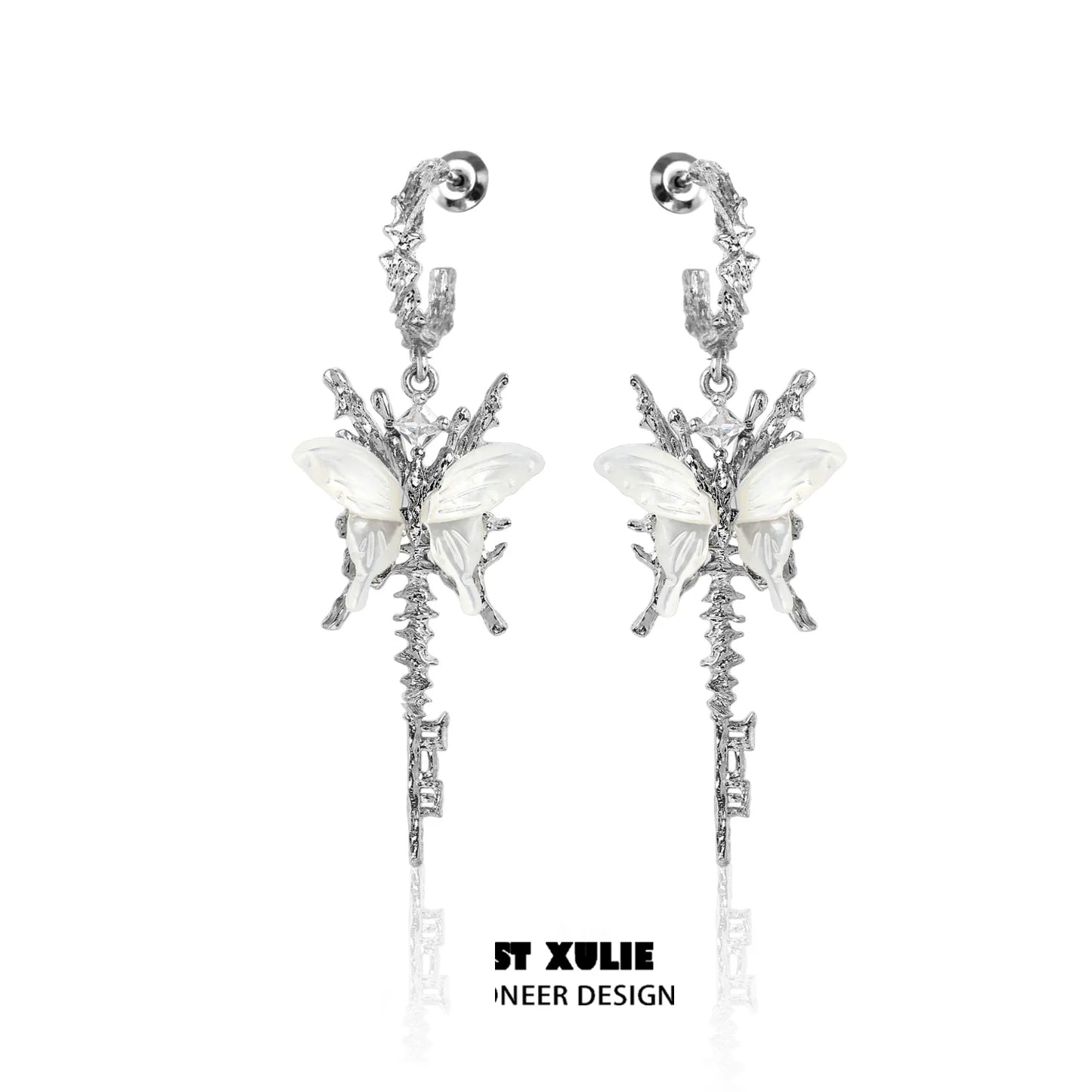 Stunning butterfly tassel shell earrings with intricate design and silver finish for elegant style