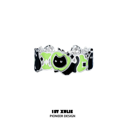Unique cat and dog silver ring featuring playful designs in green and black for pet lovers