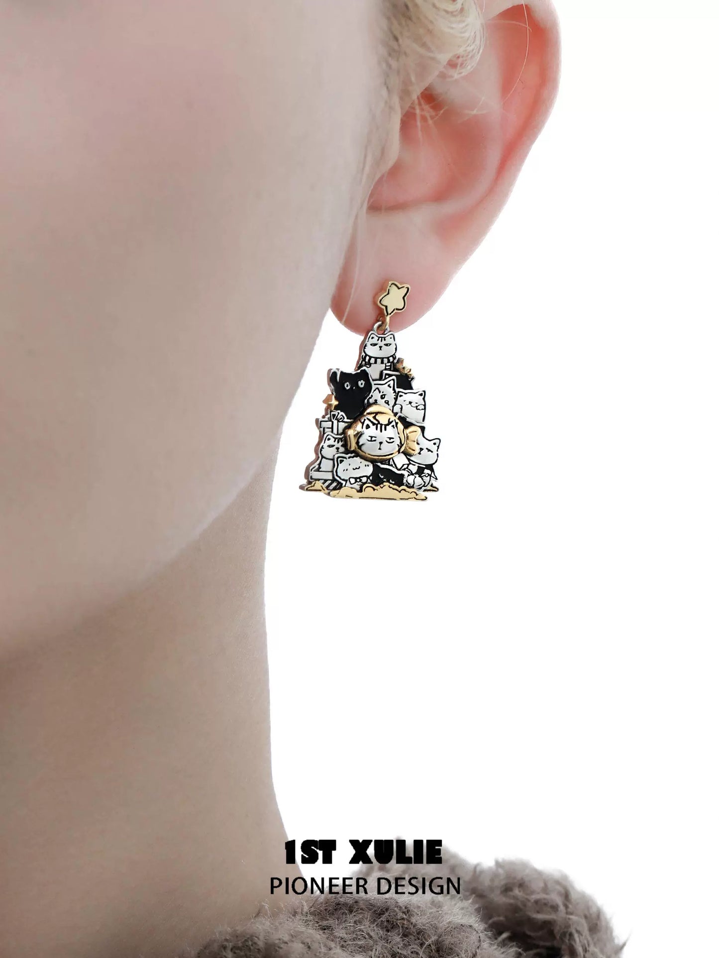 Cat family silver stud earrings featuring a playful design with multiple cats stacked together