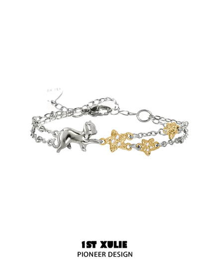 1ST XULIE Cat Star Bracelet featuring a silver cat design with gold star accents