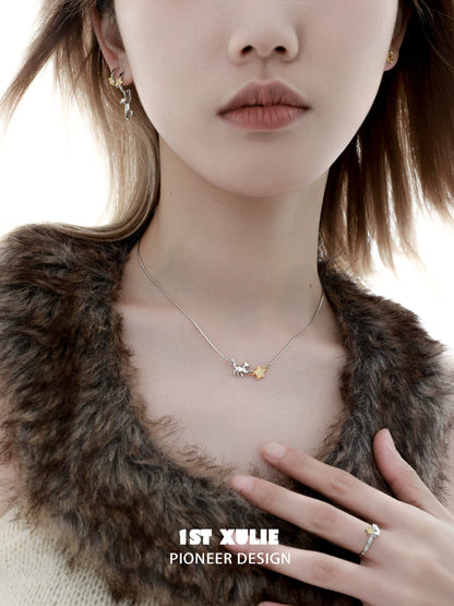 Elegant 1STXULIE cat star clavicle necklace on model with a chic outfit