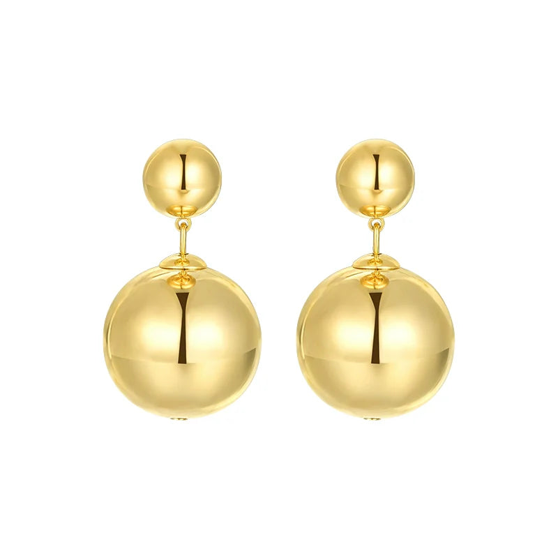 Elegant SUN HUNTER celestial planet gravity earrings in gold for stylish accessorizing