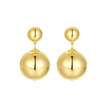 Elegant SUN HUNTER celestial planet gravity earrings in gold for stylish accessorizing