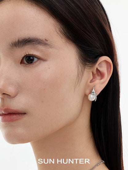 Elegant SUN HUNTER Chinese fortune gourd earrings with pearl design for a stylish look