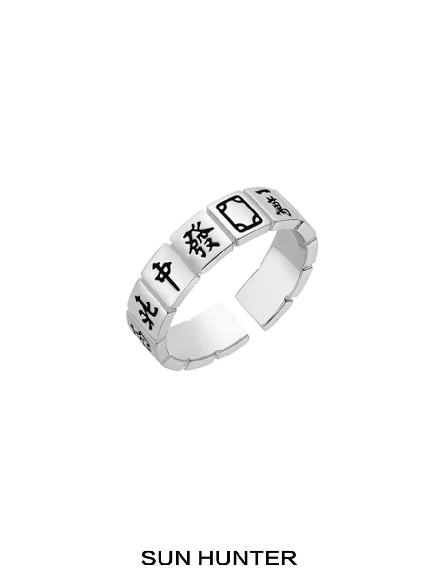 Stylish SUN HUNTER Chinese Mahjong ring with traditional game symbols in silver finish