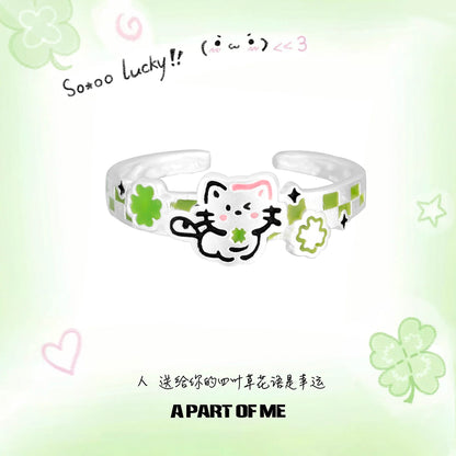 Clover cat puppy couple rings featuring a playful design with green accents and cute characters