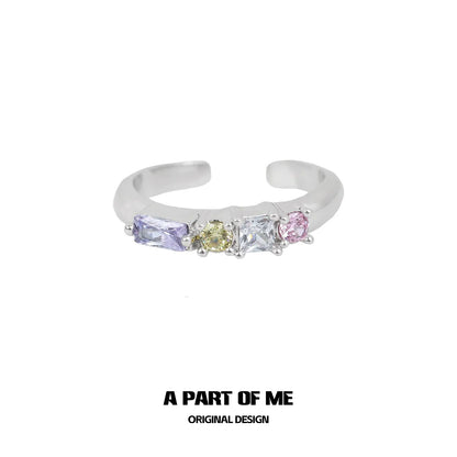 A PART OF ME colorful zircon ring featuring multi-colored gemstones on a sleek band