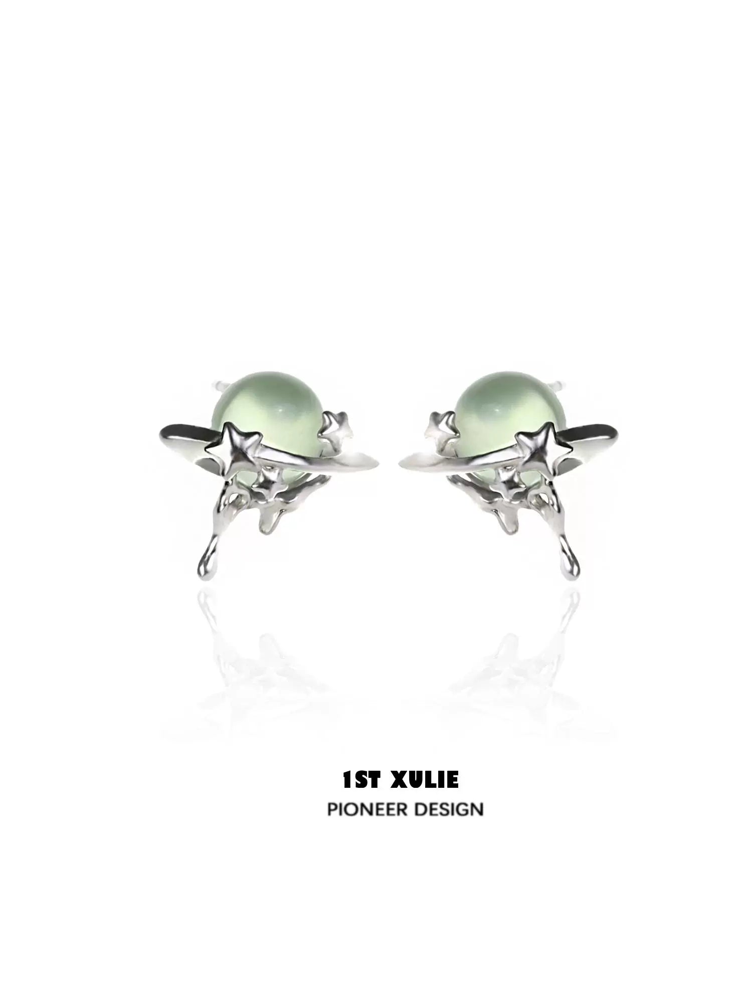 Elegant cosmic meteorite earrings featuring silver stars and green gemstones for a celestial look