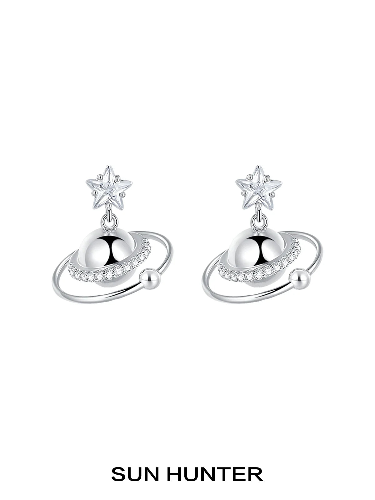 SUN HUNTER cosmic planet star earrings featuring a star and planet design with sparkling accents