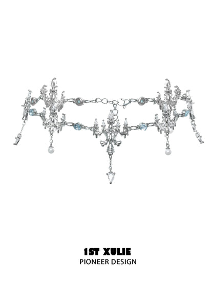 Elegant crystal fringe necklace adorned with silver accents and sparkling blue details