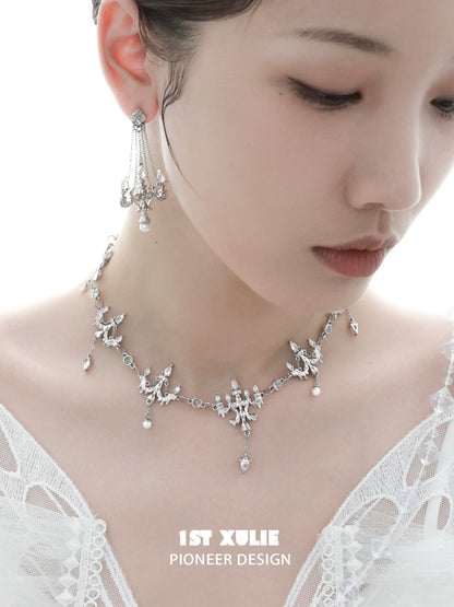 Elegant 1ST XULIE crystal fringe necklace with intricate design, perfect for formal occasions