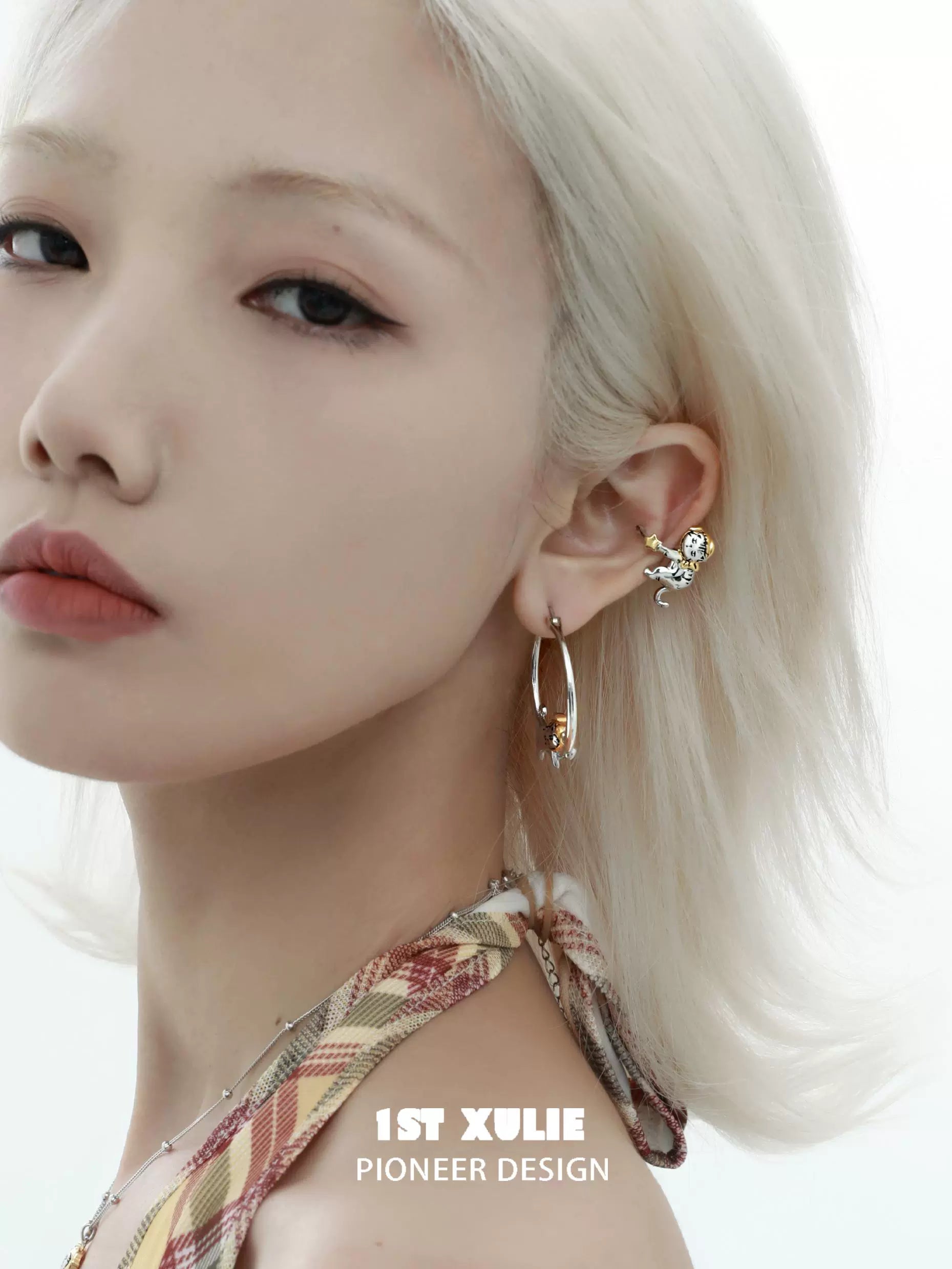 Model wearing cute cat ear clips with floral design for a trendy and playful look