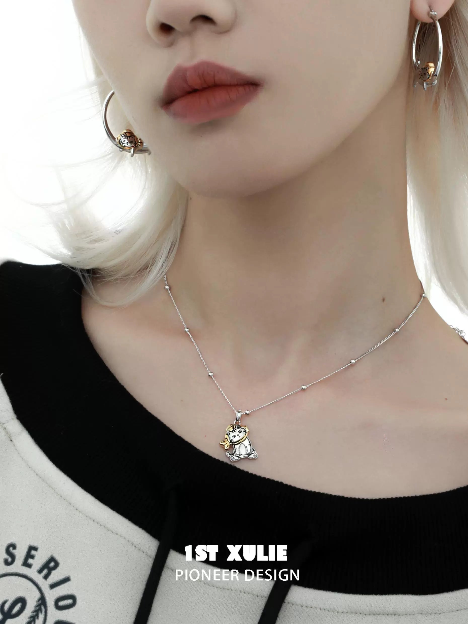 Cute cat necklace from 1ST XULIE featuring a charming cat pendant on a delicate chain