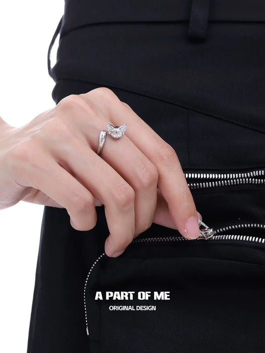 Cute cat tail silver ring by A PART OF ME showcased on a model's hand