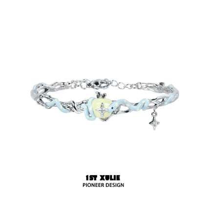 Cute snake apple bracelet with silver charm and blue accents for trendy accessory lovers