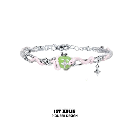 Cute snake apple bracelet featuring a playful snake and apple charm in vibrant colors