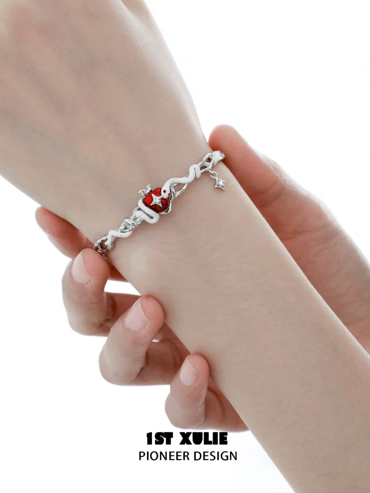 Cute snake apple bracelet from 1STXULIE featuring a charming snake design and vibrant apple charm