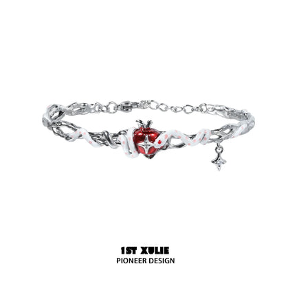 Cute snake apple bracelet from 1STXULIE featuring a silver chain and heart charm