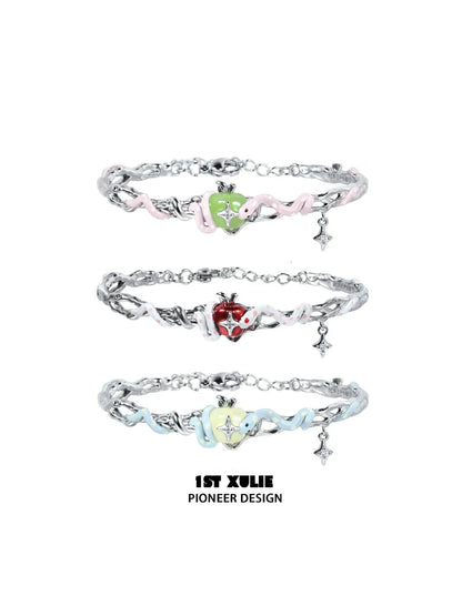 Cute snake apple bracelet in three colors featuring playful designs and a charming heart detail