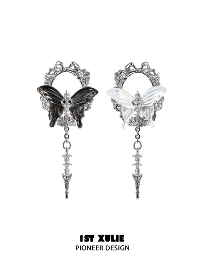 Stylish cyber butterfly earrings featuring black and white butterflies with intricate designs