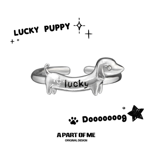 Dachshund silver ring featuring a lucky puppy design with a playful expression