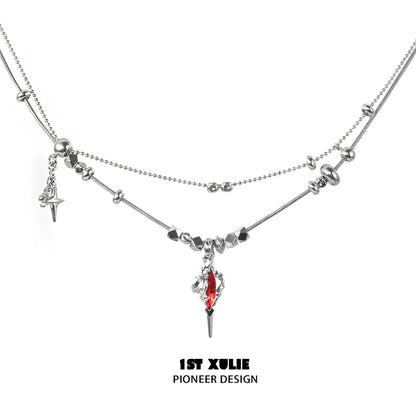 1STXULIE dark dreamcore necklace featuring silver chains and a red crystal pendant