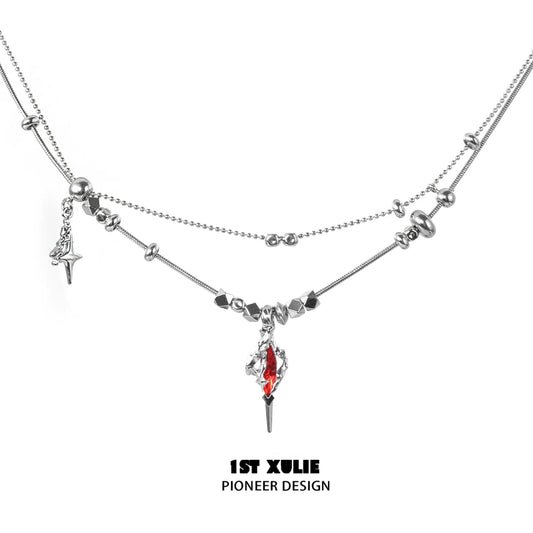 1STXULIE dark dreamcore necklace featuring silver chains and a red crystal pendant