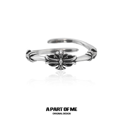 A PART OF ME dark iris vintage ring with intricate floral design in polished silver tone