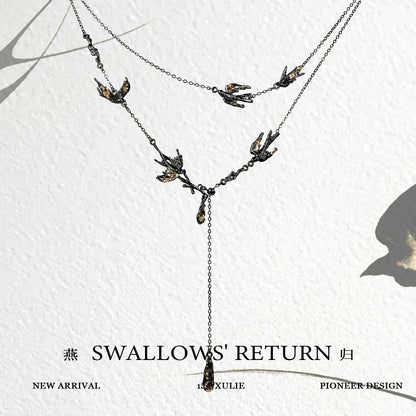 Dark swallow necklace featuring intricate bird designs and a unique layered style from 1STXULIE