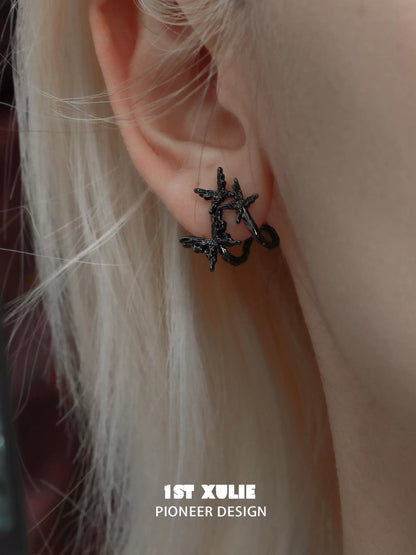 Dark thorn butterfly earrings featuring an intricate design for a unique fashion statement