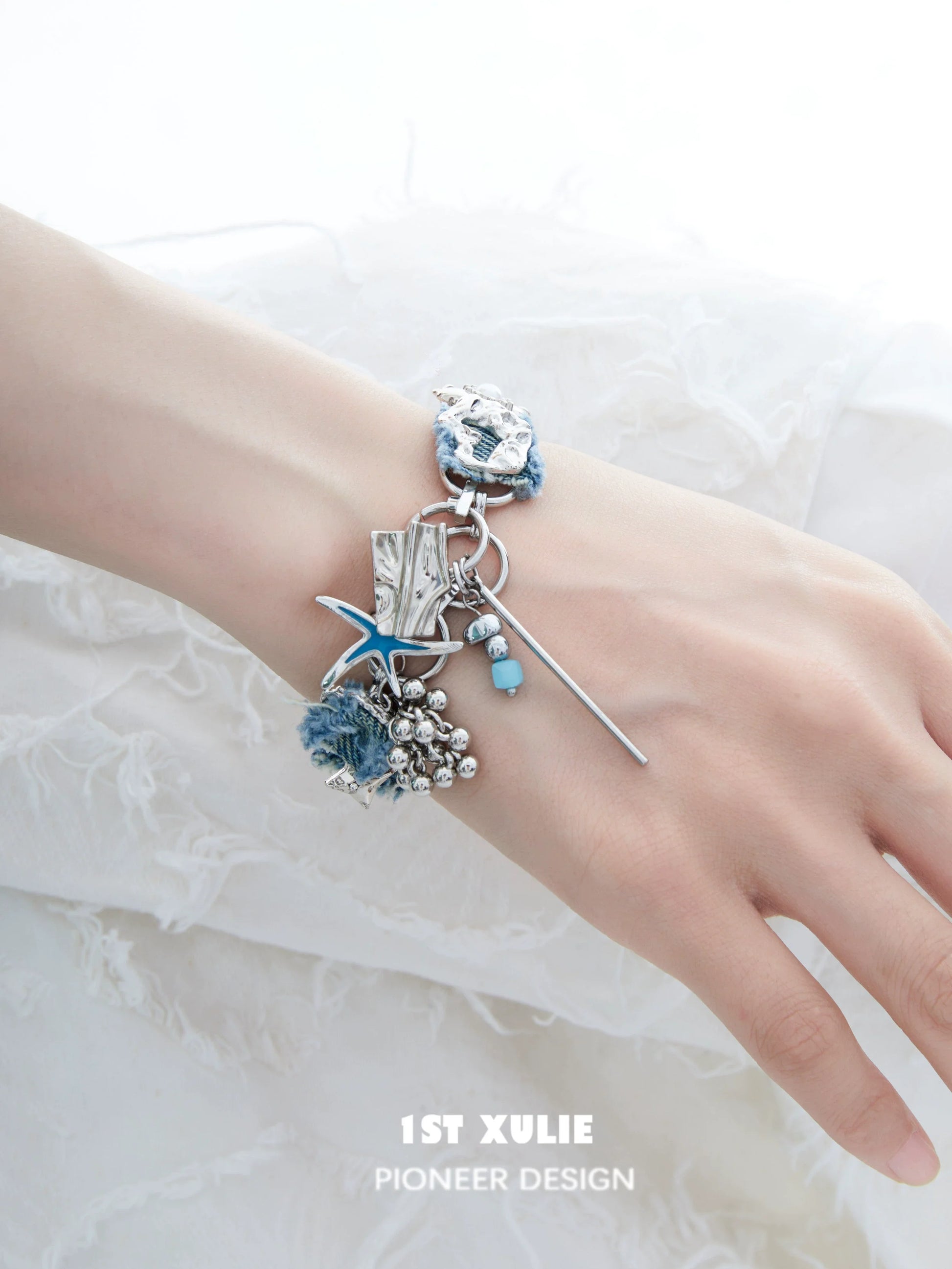 Denim star choker necklace featuring a unique design with silver accents and floral details
