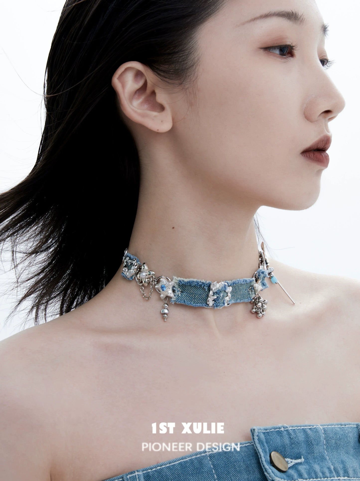 Denim star choker necklace from 1STXULIE with shiny charms and a trendy design