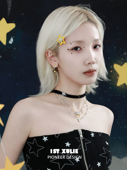 Model wearing a double layered star necklace with star-shaped charms and chic fashion style