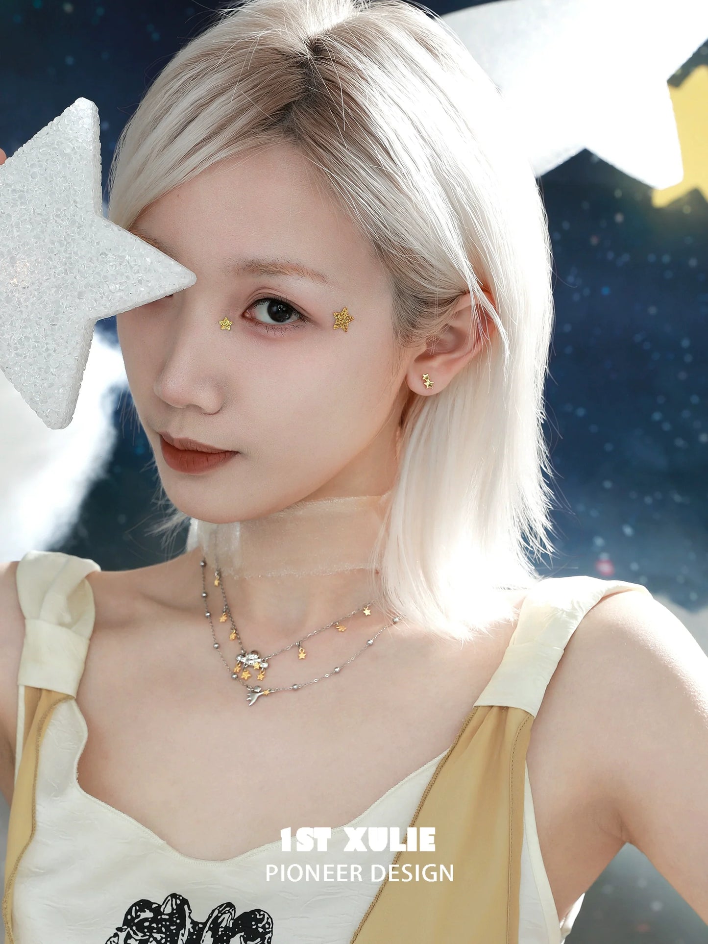 Double layered star necklace featuring delicate stars, perfect for adding a touch of sparkle to any outfit